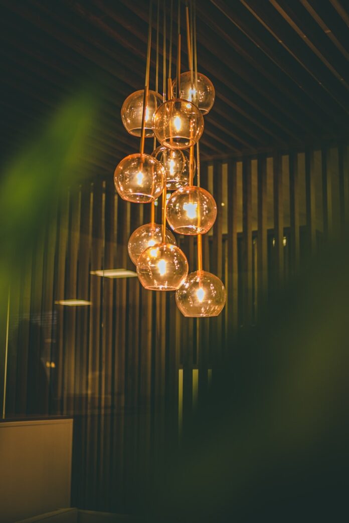 Photo by Matt Seymour selective focus photography of lit pendant lights