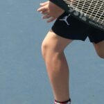 중장년의 생존 근육, 스쿼트 100개보다 중요한 ‘기능적 근력’의 비밀 a man holding a tennis racquet on top of a tennis court